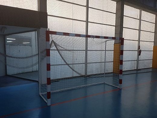 Juego de porterías con base de tubo redondo para futbol sala o balonmano transladables